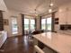 Bright dining area with modern lighting fixtures, large windows and table at 127 Sanderway Dr, Chapel Hill, NC 27516