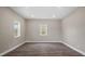 Bright living room featuring recessed lighting and wood-look flooring at 1284 Railroad St, Henderson, NC 27536