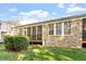 Brick home with a screened in porch and nice backyard at 1307 Seattle Slew Ln, Cary, NC 27519