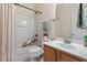 Cozy bathroom with tub-shower combination and stylish vanity at 1307 Seattle Slew Ln, Cary, NC 27519