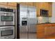Kitchen features stainless steel appliances and ample cabinet space at 1307 Seattle Slew Ln, Cary, NC 27519