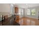 Well-lit kitchen with granite countertops, hardwood floors, and ample cabinet space at 1307 Seattle Slew Ln, Cary, NC 27519