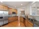 Spacious kitchen with stainless steel appliances, granite countertops, and ample cabinet storage at 1307 Seattle Slew Ln, Cary, NC 27519