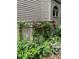 Landscaped backyard with flowers, lush greenery and privacy fence at 1425 Bascomb Dr, Raleigh, NC 27614