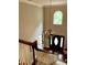 Grand foyer with high ceilings, chandelier, hardwood floors, and a view of the front door at 1425 Bascomb Dr, Raleigh, NC 27614