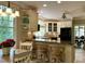 Open kitchen with breakfast bar seating and stainless steel appliances at 1425 Bascomb Dr, Raleigh, NC 27614