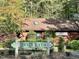 Entrance of the community pool with sign and landscaping, inviting for a refreshing swim at 1425 Bascomb Dr, Raleigh, NC 27614