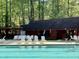 Community pool with lounge chairs and poolside access, ideal for summer relaxation at 1425 Bascomb Dr, Raleigh, NC 27614
