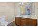Modern bathroom featuring a double sink vanity and granite countertop at 1432 E Stonemason Dr, Fuquay Varina, NC 27526