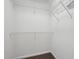 Walk-in closet with wire shelving for ample storage, and carpeted floor at 1432 E Stonemason Dr, Fuquay Varina, NC 27526