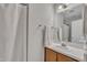 Bathroom with vanity, shower/tub, mirror, and towel rack in a well-maintained space at 1442 Barton Place Dr, Raleigh, NC 27608