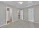 Bedroom with carpet and three doorways providing easy access to other areas of the home at 1442 Barton Place Dr, Raleigh, NC 27608