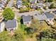 Aerial view of a home with a wood deck and green lawn among several residential homes in a quiet neighborhood at 145 Ryder Cup Cir, Raleigh, NC 27603