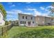 Spacious backyard featuring a well-maintained lawn and a white fenced-in porch at 145 Ryder Cup Cir, Raleigh, NC 27603