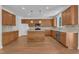Open kitchen featuring stainless appliances, granite countertops, tile backsplash, and modern lighting at 145 Ryder Cup Cir, Raleigh, NC 27603