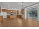 Modern kitchen with stainless appliances, granite countertops, ample cabinet space, and sliding glass doors at 145 Ryder Cup Cir, Raleigh, NC 27603