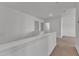 Upstairs landing area with view to bedrooms and staircase at 145 Ryder Cup Cir, Raleigh, NC 27603