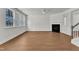 Spacious living area with a fireplace and bright, airy windows at 145 Ryder Cup Cir, Raleigh, NC 27603