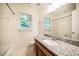 Bathroom featuring a bathtub with shower and a vanity with a sink at 15 Pine Ridge, Pittsboro, NC 27312