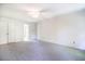 Bright bedroom featuring neutral carpet, base molding, and paneled doors at 15 Pine Ridge, Pittsboro, NC 27312