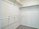 Walk-in closet with carpet flooring and hanging racks at 15 Pine Ridge, Pittsboro, NC 27312
