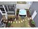 Backyard with hot tub, screened porch, and fenced yard at 1526 Millrock Trl, Wendell, NC 27591