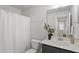 Bathroom featuring a modern vanity with quartz countertop and neutral wall color at 1526 Millrock Trl, Wendell, NC 27591