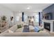 Cozy living room with fireplace and comfortable sofa seating at 1526 Millrock Trl, Wendell, NC 27591