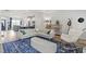 Bright and airy living room with an open layout, comfortable seating, and seamless flow to the kitchen at 1526 Millrock Trl, Wendell, NC 27591