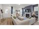Bright living room with fireplace, couch, and natural light at 1526 Millrock Trl, Wendell, NC 27591
