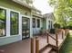 Comfortable back porch has stained wood, room for outdoor seating, and yard views at 1811 Park Dr, Raleigh, NC 27605