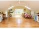 Charming bedroom features hardwood floors, natural light from the skylights, and ceiling fan at 1811 Park Dr, Raleigh, NC 27605