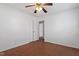 Cozy bedroom boasting wood floors, a ceiling fan, and a closet at 1813 Grady Dr, Durham, NC 27712