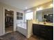 The ensuite bathroom has a soaking tub, double vanity, and a large walk-in closet at 198 Shadowbark Dr, Garner, NC 27529