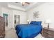 Comfortable main bedroom with a ceiling fan, and a large bed at 214 S Camellia St, Chapel Hill, NC 27516