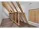 View of framed attic space, which is ready for build out at 216 Bella Rose Dr, Chapel Hill, NC 27517