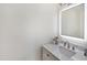 Elegant bathroom featuring a lighted mirror, stylish sink, and modern fixtures at 216 Bella Rose Dr, Chapel Hill, NC 27517