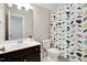 Bathroom featuring colorful shower curtain, a modern vanity, and a separate toilet area at 216 Bella Rose Dr, Chapel Hill, NC 27517