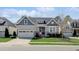 Charming single-Gathering home featuring a landscaped front yard and attached two-car garage at 216 Bella Rose Dr, Chapel Hill, NC 27517