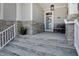 Charming front porch with stone accents, a cozy bench, decorative wreath, and welcoming ambiance at 216 Bella Rose Dr, Chapel Hill, NC 27517