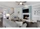 Cozy living room with a fireplace, stylish decor, and ample seating at 216 Bella Rose Dr, Chapel Hill, NC 27517