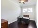 Bright office space with hardwood floors, a desk, and natural light at 216 Bella Rose Dr, Chapel Hill, NC 27517