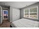 Bright bedroom with a walk-in closet and neutral decor, offering a peaceful retreat at 218 Maple Walk St, Durham, NC 27703