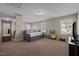 Spacious bonus room offering flexible living space and plenty of natural light from multiple windows at 218 Maple Walk St, Durham, NC 27703