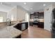 Modern kitchen boasts granite countertops, stainless steel appliances, and ample counter space at 218 Maple Walk St, Durham, NC 27703