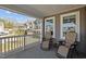 Inviting porch with comfortable seating, perfect for relaxing and enjoying the neighborhood views at 218 Maple Walk St, Durham, NC 27703