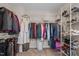 Spacious walk-in closet, offering practical storage solutions with shelves, drawers, and hanging areas at 218 Maple Walk St, Durham, NC 27703