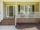 Home front porch featuring steps and seating at 2213 Ravens Creek Ct, Raleigh, NC 27603