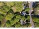 Neighborhood aerial view with mature trees and winding street, showcasing the home's peaceful, desirable location at 2221 Dungiven Ct, Garner, NC 27529