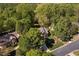 Attractive home nestled among mature trees, offering privacy and a peaceful setting in a lovely neighborhood at 2221 Dungiven Ct, Garner, NC 27529